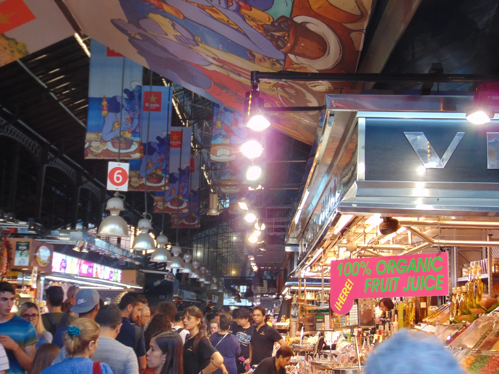Fresh produce stalls inside the Mercat de la Boqueria food market in Barcelona