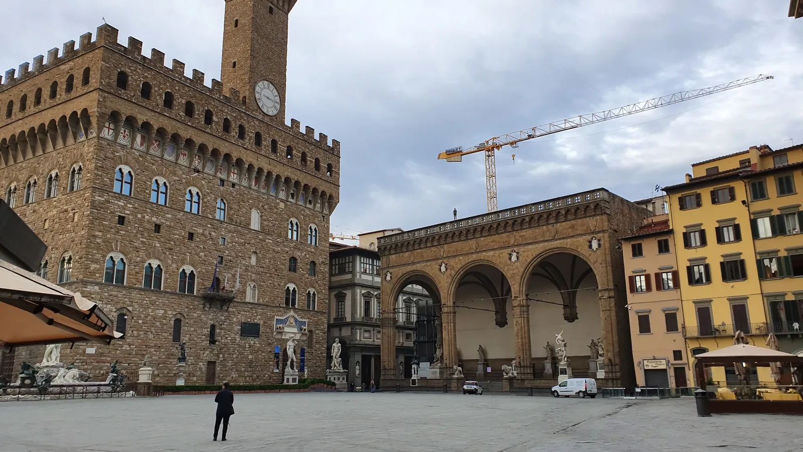 Piazza della Signoria in Florence with the Palazzo Vecchio tower and the statue-filled Loggia dei Lanzi