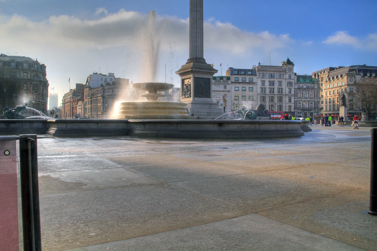 Nelson's Column and the fountains in Trafalgar Square, London, on a sunny afternoon