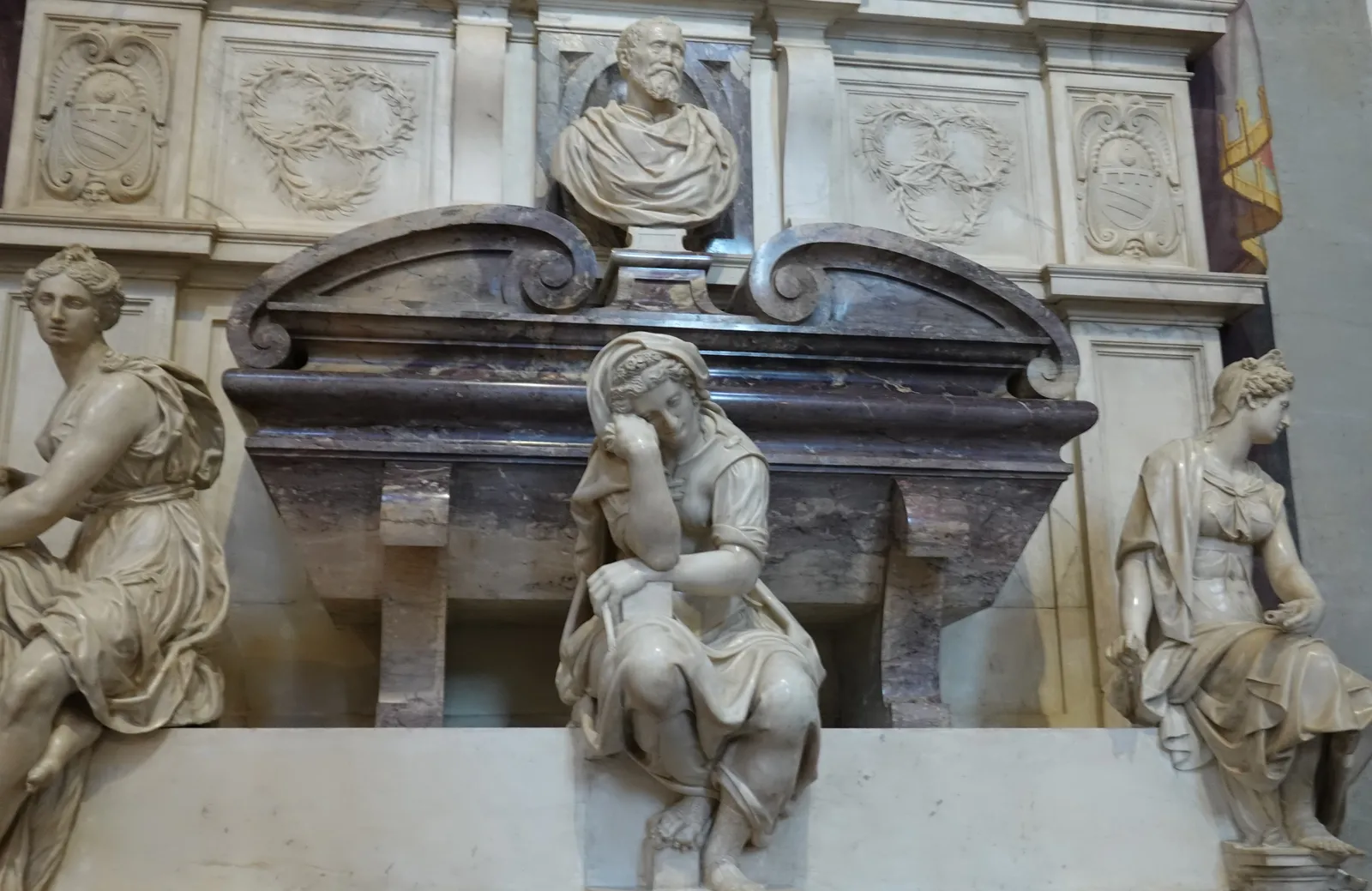 Michelangelo's marble tomb monument by Vasari inside the Basilica di Santa Croce in Florence